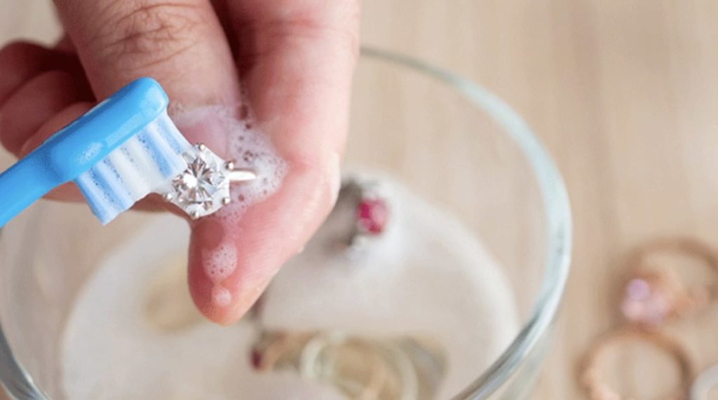 Clean your jewelry with gentle soap and warm water