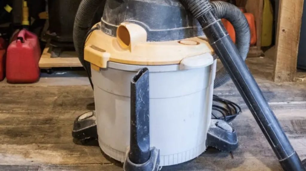 Extend the vacuum hose so it vents to the outside