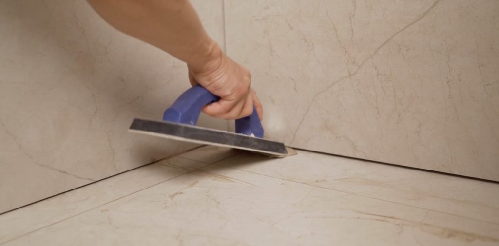 How do I clean tile grout