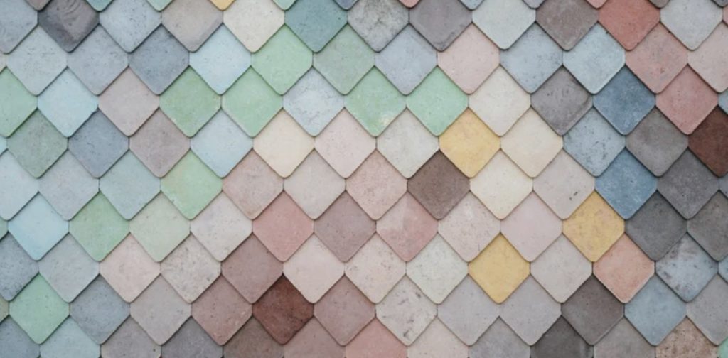 How often should I clean my floor tiles