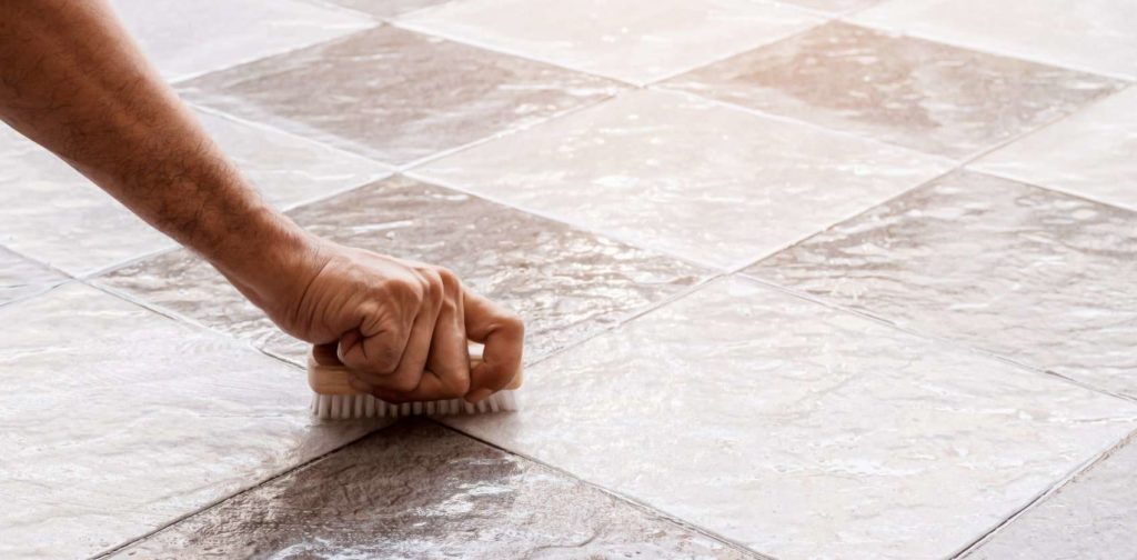 Scrub the floor tiles